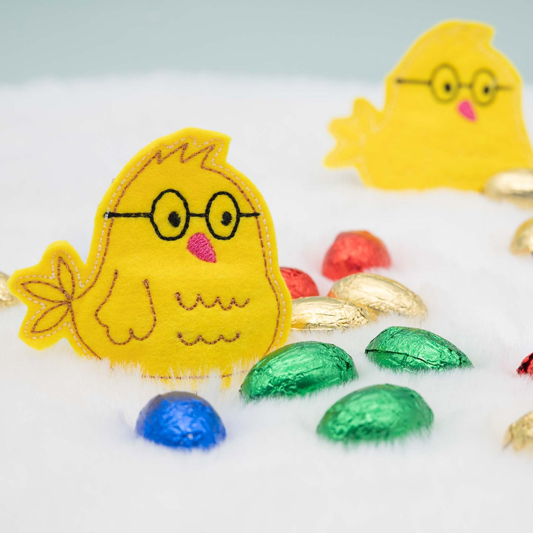 Stickdatei Küken mit Schokoladen-Versteck